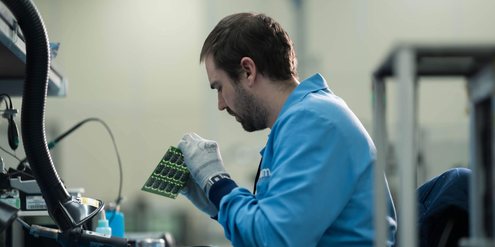 man-working-on-circuit-board.jpg