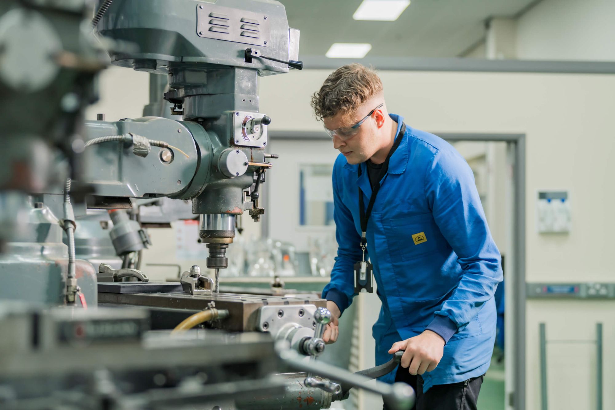 man-working-on-metal-machine.jpg